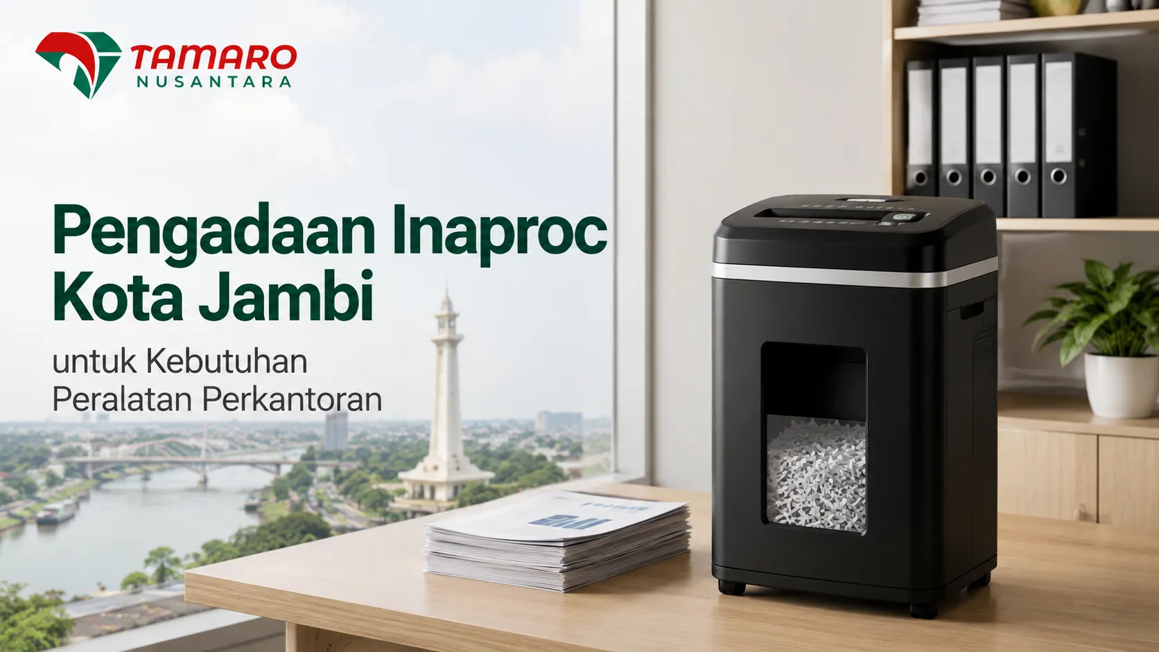 Mesin penghancur kertas hitam dengan jendela transparan berisi potongan dokumen di atas meja kantor dekat jendela yang menampilkan pemandangan Jembatan Gentala Arasy Kota Jambi. Terdapat logo Tamaro Nusantara serta teks Pengadaan Inaproc Kota Jambi untuk Kebutuhan Peralatan Perkantoran.